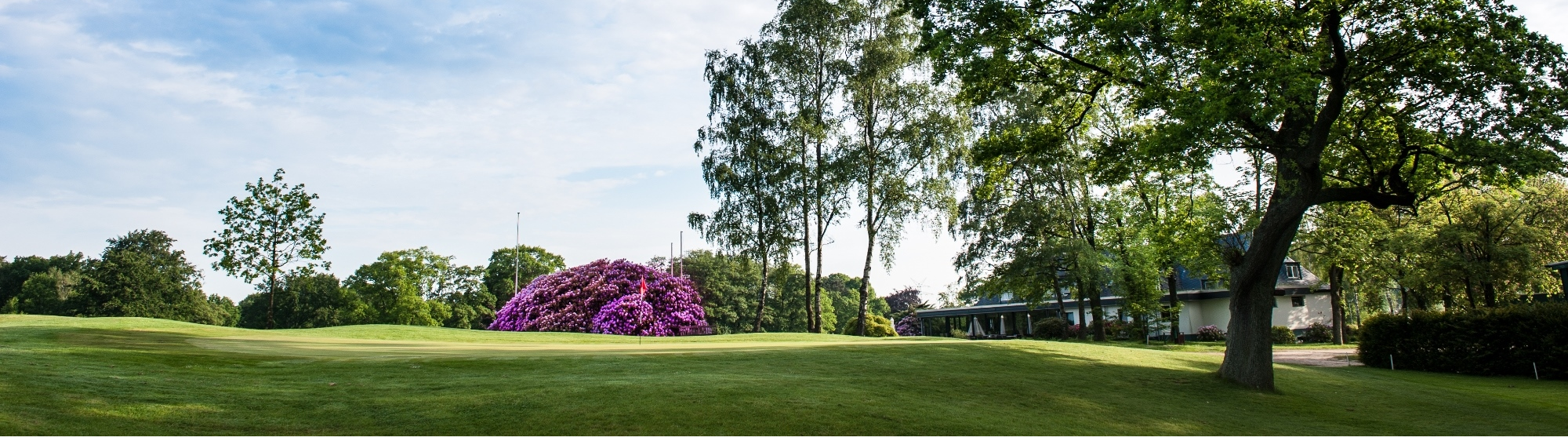 Herrlicher Ausblick von der Clubterrasse aus auf Loch 13 und die sieben Eichen Herrlicher Ausblick von der Clubterrasse aus auf Loch 13 und die sieben Eichen